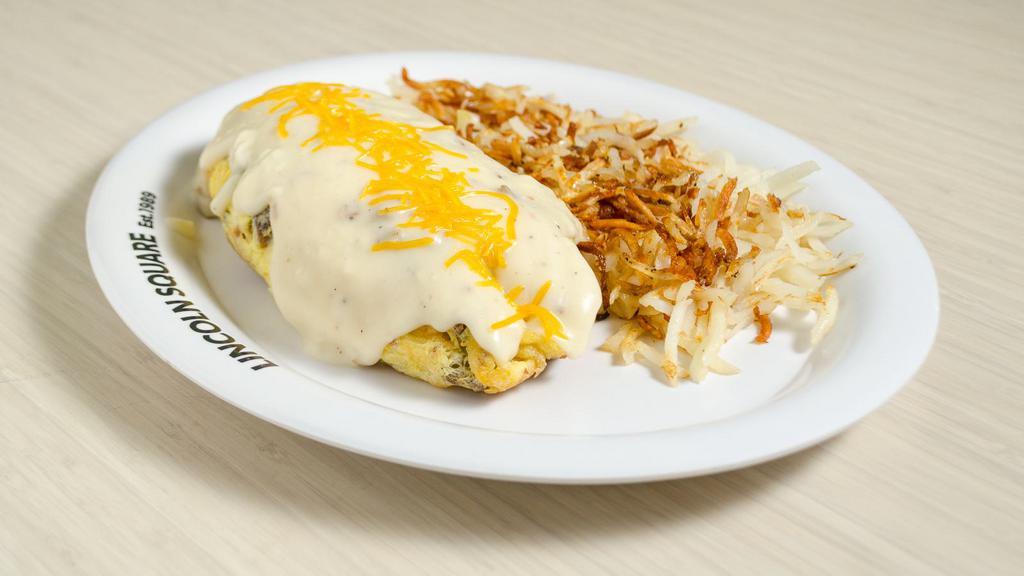 Biscuit & Gravy Omelet · Omelet mixed with biscuits, sausage, cheddar cheese & topped with homemade sausage gravy. No bread choice.
