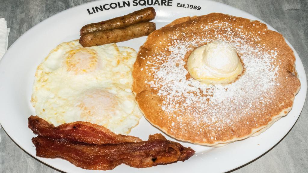 Pancake Platter · Dusted with powdered sugar & topped with our own homemade whipped butter served with two strips of bacon, two sausage links & two eggs any style.