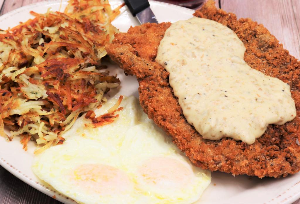 Chicken Fried Steak & Eggs · House breaded cube steak, sausage gravy, hash browns, and two eggs served your way.