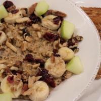 Ge Oatmeal · Steel cut oats, cooked to perfection & topped with mixed nuts, diced apples, dried fruit, ba...
