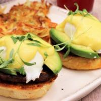 Acapulco Benedict · Toasted English muffin, poached eggs, chorizo sausage, and avocado. Topped with crafted holl...