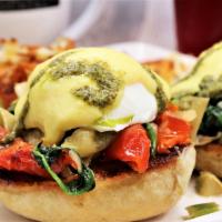 Vegetable Benedict · Toasted English muffin, poached eggs, roasted tomato, spinach, onion, green pepper, and fire...