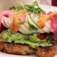 Avocado Toast · Toasted seed grain bread, crushed avocado, roasted tomato, pickled red onion, hard boiled eg...