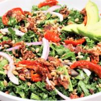 Blt Salad · Kale, red onion, roasted tomato, sunflower seeds, bacon, avocado, and lemon vinaigrette.