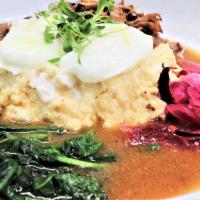 Southern Bowl · Creamy cheddar grits, pulled pork, Carolina Jus, sauteed spinach, pickled red onion, poached...