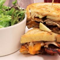 Turkey Apple · Sliced roasted turkey breast, thick-cut bacon, cheddar cheese, granny smith apples, and pean...