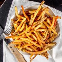 Hand Cut Fries · House cut fries with salt & herbs.