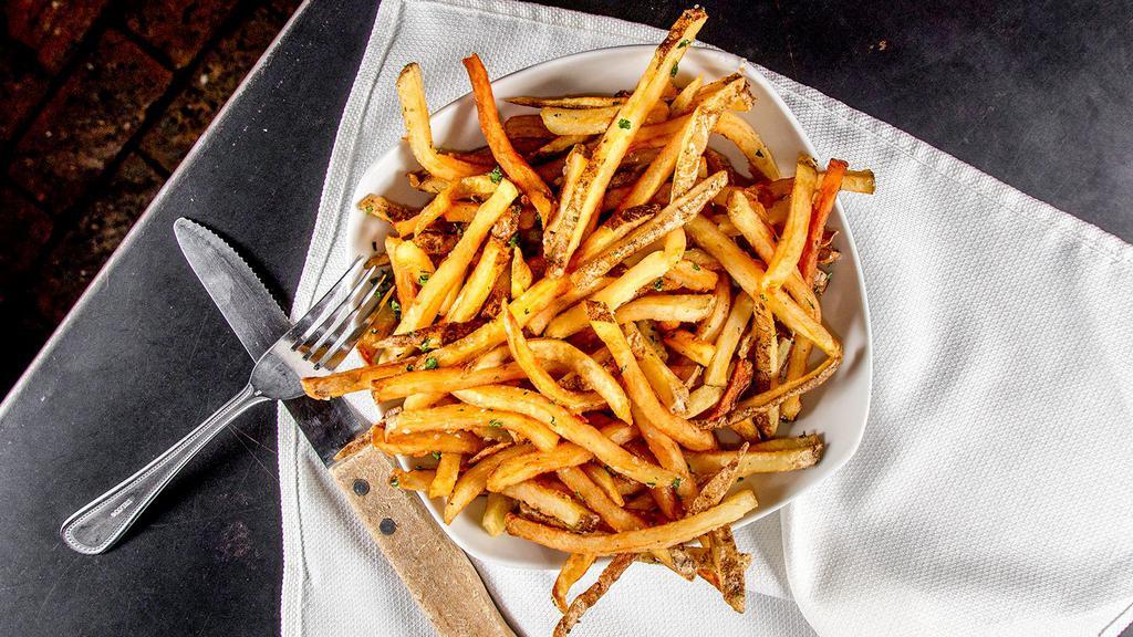 Hand Cut Fries · House cut fries with salt & herbs.