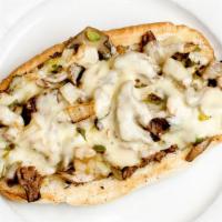 Philly Steak Sub · Shredded steak sautéed with green peppers, mushrooms, onions, and melted swiss cheese.