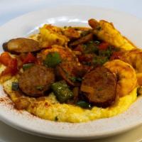 Shrimp And Grits · Shrimp and andouille sausage, red and green peppers, yellow and green onions, creole seasoni...