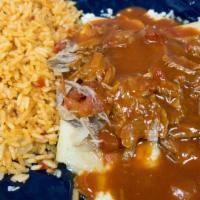 Lunch Enchiladas Rancheras · Two cheese enchiladas, topped with shredded beef or pork red sauce served with rice or beans.