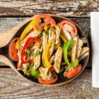 Fajitas De Pollo · Sautéed chicken breast served with onion tomatoes, red and green peppers.