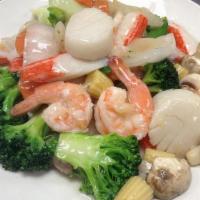 Seafood Delight · Scallops, crab meat, and shrimp with baby corn, broccoli, mushrooms, and Chinese vegetables ...