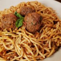 Spaghetti & Meatballs · 100% beef handmade meatballs and basil pomodoro sauce tossed with spaghetti.