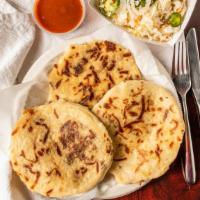 Zucchini & Cheese Order Of 3 · A plate of three zucchini and cheese pupusas. Served with a side of our homemade curtido(sla...