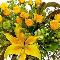 Good As Gold · Citrus-hued blossoms – including roses, lilies and more – create a mix of mellow yellows in ...