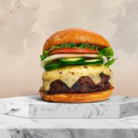 El Camino Burger · House-made, seasoned patty perfectly cooked to medium, topped with topped with melted cheese...