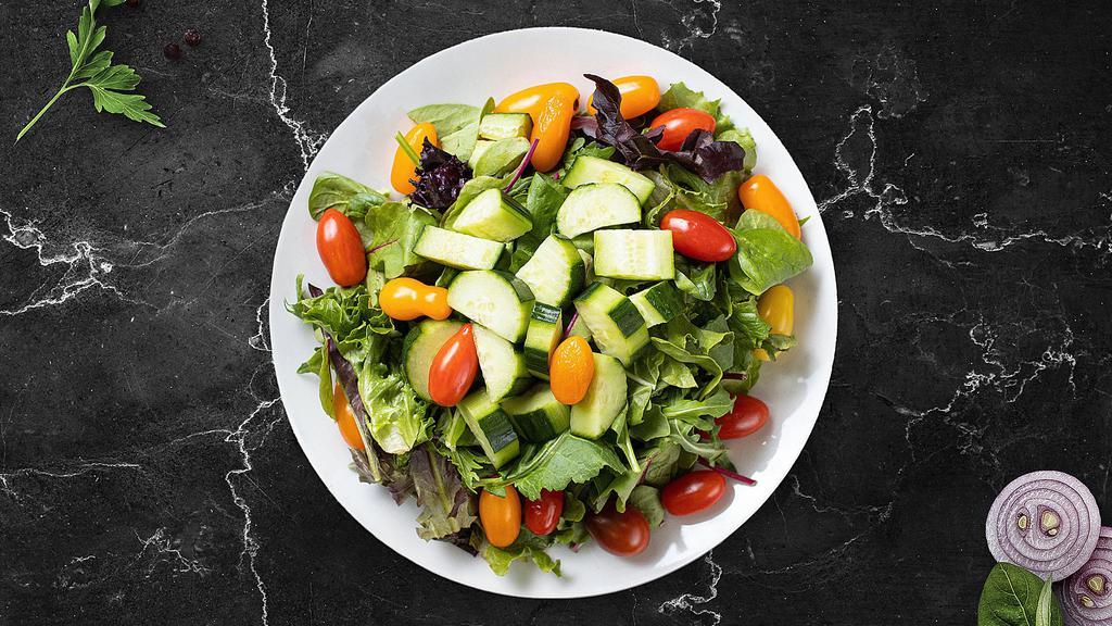 Garden Salad Of Eden · Fresh green lettuce mix, tomatoes, black olives, red onions, bell peppers, and shredded mozzarella cheese. Served with choice of your dressing on the side.