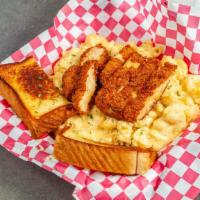 Chicken Mac N Cheese · Choice of fried chicken cutlet or grilled chicken on top.