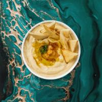 Hummus Plate · A mixture of mashed garbanzo beans, lemon juice and tahini, and garlic served with two piece...