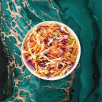 Coleslaw · (Vegetarian) Shredded cabbage and carrots dressed in mayonnaise and apple cider vinegar.