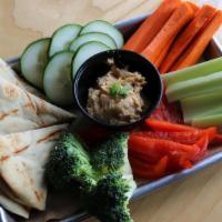 Hummus Plate · Roasted red pepper hummus, served with a vegetable assortment and house-made roasted garlic ...