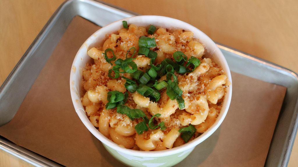 Spicy Mac & Cheese · Elbow macaroni in a house-made cheese sauce with a kick. Tone down the spice by asking for city mac instead!