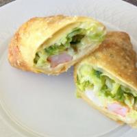 Shrimp Egg Roll · Crispy dough filled with minced vegetables.