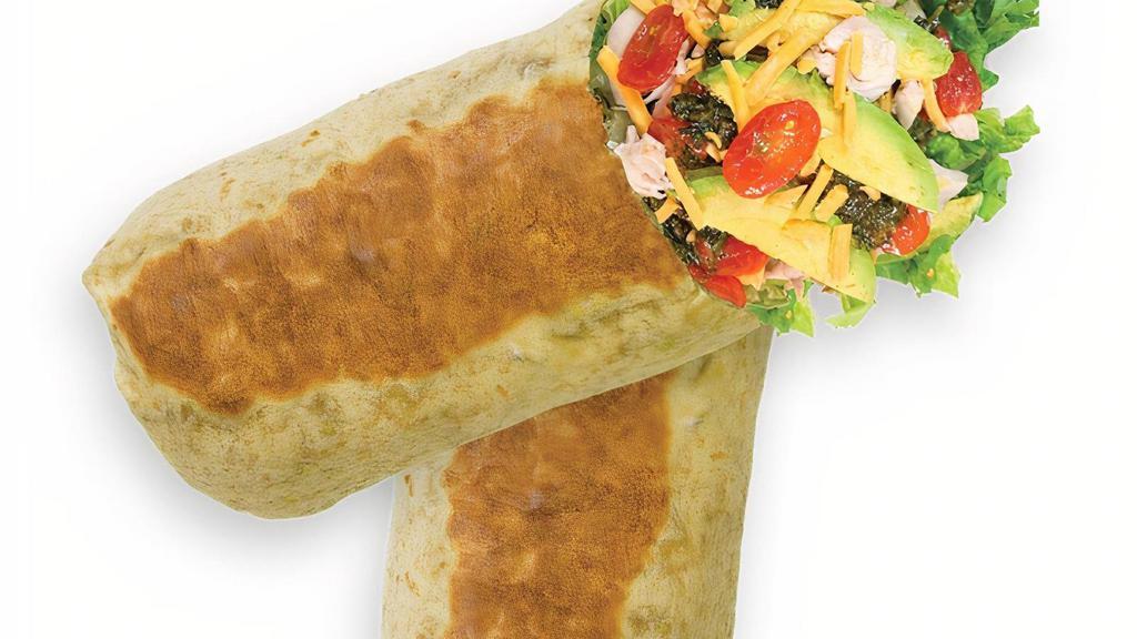 Cilantro Chicken · Chicken wrap with sliced tomatoes, cheddar cheese, romaine, avocado, and spicy cilantro sauce. Your choice of tortilla. 510 cal (tortilla not included in calories).
