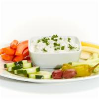 Taziki Dip · Greek yogurt, cucumber, dill, and a hint of lemon define this refreshing classic. Vegetarian.