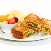 Tomato-Basil Sandwich · Feta, tomatoes, fresh basil, and basil-pesto sauce, on toasted bread. Served with Chips and ...