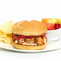 Grilled Chicken Sandwich · With feta cheese and grilled onions on a Kaiser bun. Served with Chips and choice of a Homem...