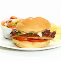 Grilled Tilapia Sandwich · With caper-dill tartar sauce. Grilled and served with tomato and lettuce on a Kaiser bun. Se...