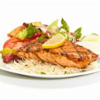 Grilled Salmon Feast · 500 cal. Atlantic salmon, seasoned and char-grilled to perfection. Served with Greek salad a...