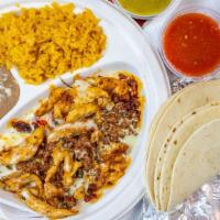 Chori Pollo · Grilled chicken & chorizo with cheese dip & a side of rice and beans. Also served with torti...