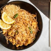 Pad Thai · Sautéed rice noodles with bean sprouts, eggs, and green onions. Topped with lemon and crushe...
