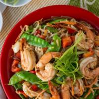 O. Shrimp · Shrimp stir-fried with green onions, snow peas, red peppers, carrots & X.O. Sauce, served wi...