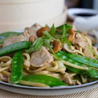 # Chicken & Cashew · Stir-fried in oyster sauce & served with canton egg noodles