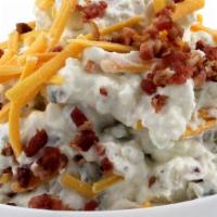 Steakhouse Potato Salad · Chunky Red Skin potatoes are mixed with sour cream, cheddar and bacon bits. That  Smokey fla...
