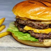 Double Cheeseburger · Served with mayo, mustard,ketchup  lettuce, tomato 
pickles , onions and american cheese