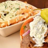 Great Greek Gyro -Chicken · BEEF/LAMB OR GRILLED CHICKEN. Lettuce, Tomatoes, Red Onions, Tzatziki and Feta