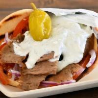 Traditional Gyro · BEEF/LAMB OR GRILLED CHICKEN. Tomatoes, Red Onions, Tzatziki