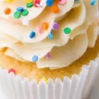 Vanilla · Vanilla cake topped with vanilla buttercream and rainbow sprinkles