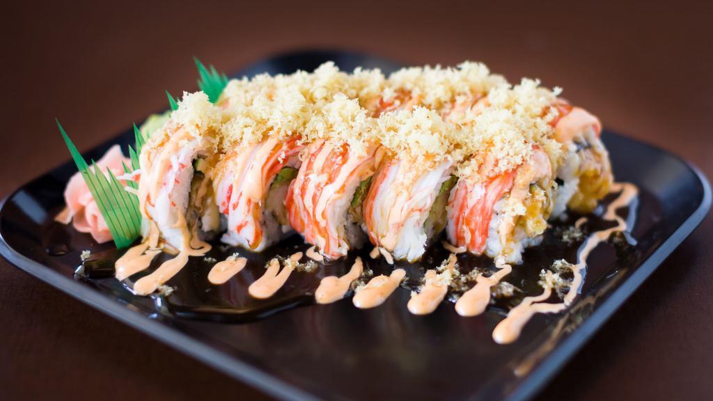 Badger Roll · Shrimp tempura, avocado, cream cheese topped with crab stick, teriyaki sauce, spicy mayo & crunches