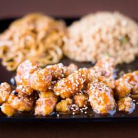 Sesame Chicken · Crispy chicken with our house sweet brown sauce and sesame seeds.