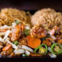 General Chicken · Mild Spicy. Crispy chicken with our house sweet brown sauce, carrots, onions and jalapeño.