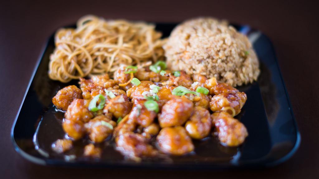 Orange Chicken · Crispy chicken with our house sweet brown sauce, onions and orange peel.