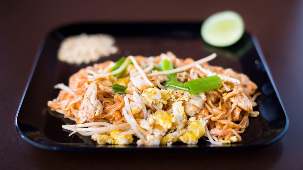 Pad Thai Noodles · Rice noodles with egg, bean sprouts, green onions, served with ground peanuts and lime.