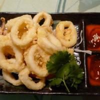Crispy Calamari · Deep-fried calamari ring. Served with sweet-sour sauce.
