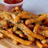 Garlic Parmesan Fries · Natural cut fries tossed with garlic parmesan sauce, romano cheese and served with marinara ...